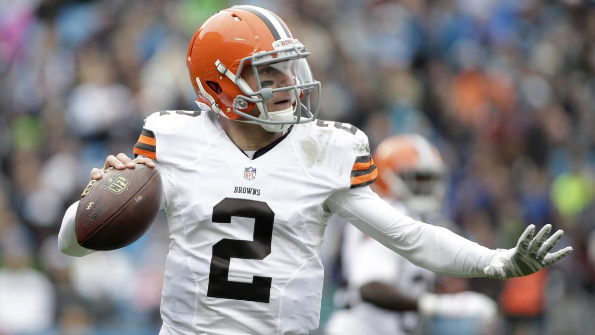 The Cleveland Browns' Johnny Manziel looks to pass during a loss to the Carolina Panthers on Dec. 21, 2014.