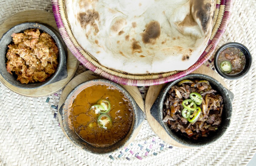 House of Mandi shakshuka, foul, lamb liver and bread