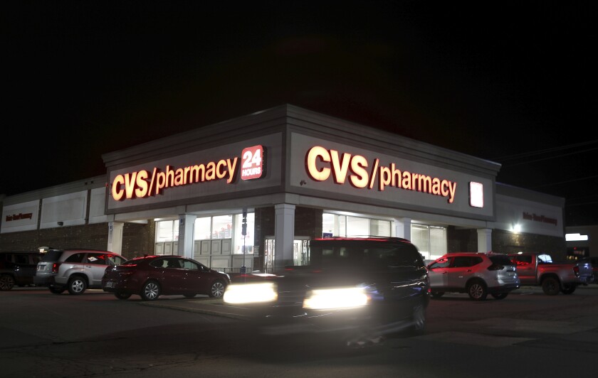 CVS Pharmacy on Moosic Street is illuminated at night, Wednesday, April 21, 2021, in Scranton, Pa. (Jake Danna Stevens/The Times-Tribune via AP)