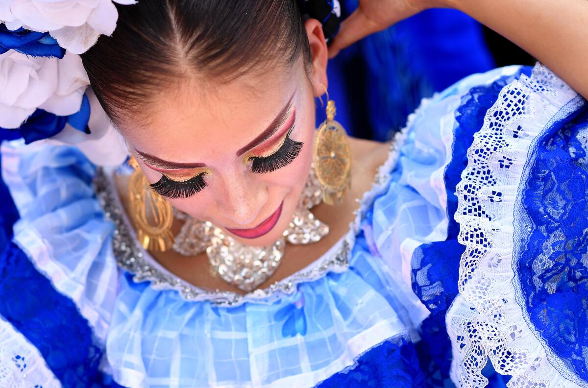 A performer prepares to take the stage during the "Festival Victor Puebla" in Puebla, Mexico.