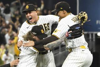 San Diego, CA - October 15: The San Diego Padres celebrate after defeating the Los Angeles Dodgers.