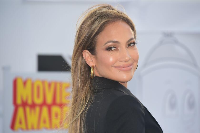 Jennifer Lopez poses on arrival for the 2015 MTV Movie Awards in Los Angeles on April 12.