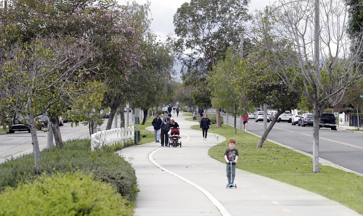 Several people enjoyed the Chandler Bikeway in Burbank this past Tuesday as shelter-in-place orders allowed them to walk, jog and bike for exercise, following social-distancing guidelines.
