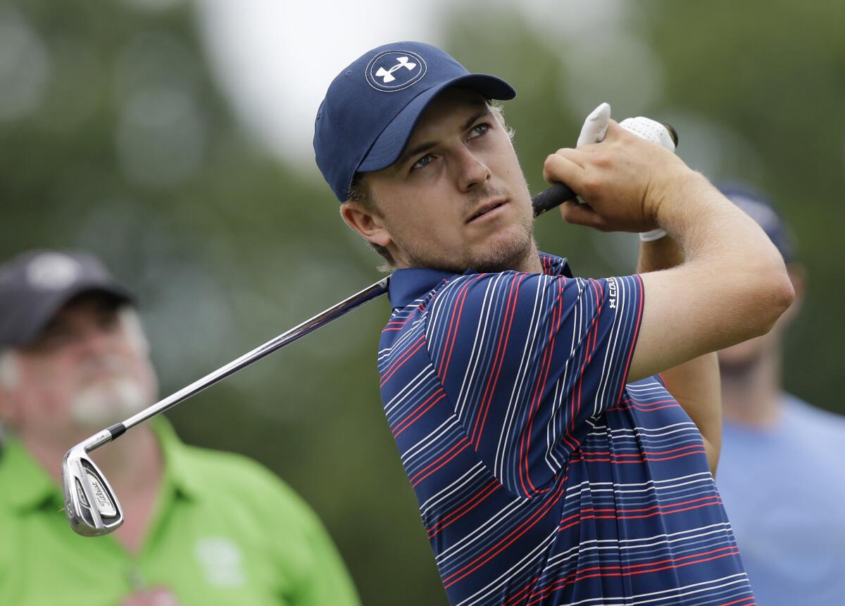Jordan Spieth hits during a practice round on June 29.