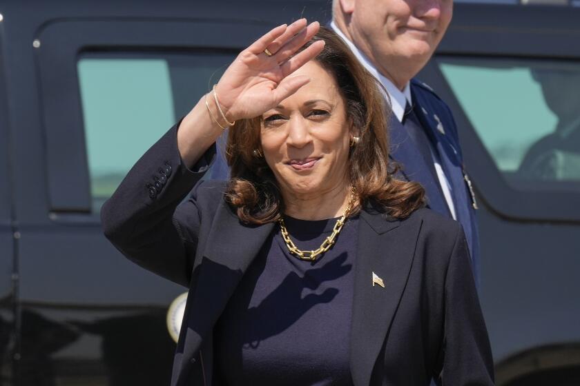 Democratic presidential nominee Vice President Kamala Harris waving to media members as she arrives at Pittsburgh International Airport, in Coraopolis, Pa., Thursday, Sept. 5, 2024, where she is expected to prepare for the first presidential debate. (AP Photo/Jacquelyn Martin)