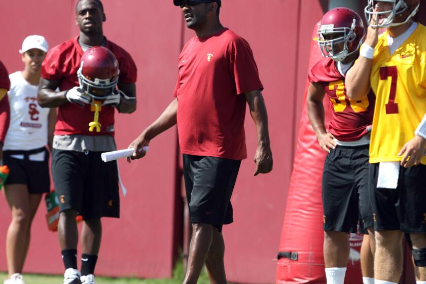 Todd McNair coaches USC tailbacks in 2009.