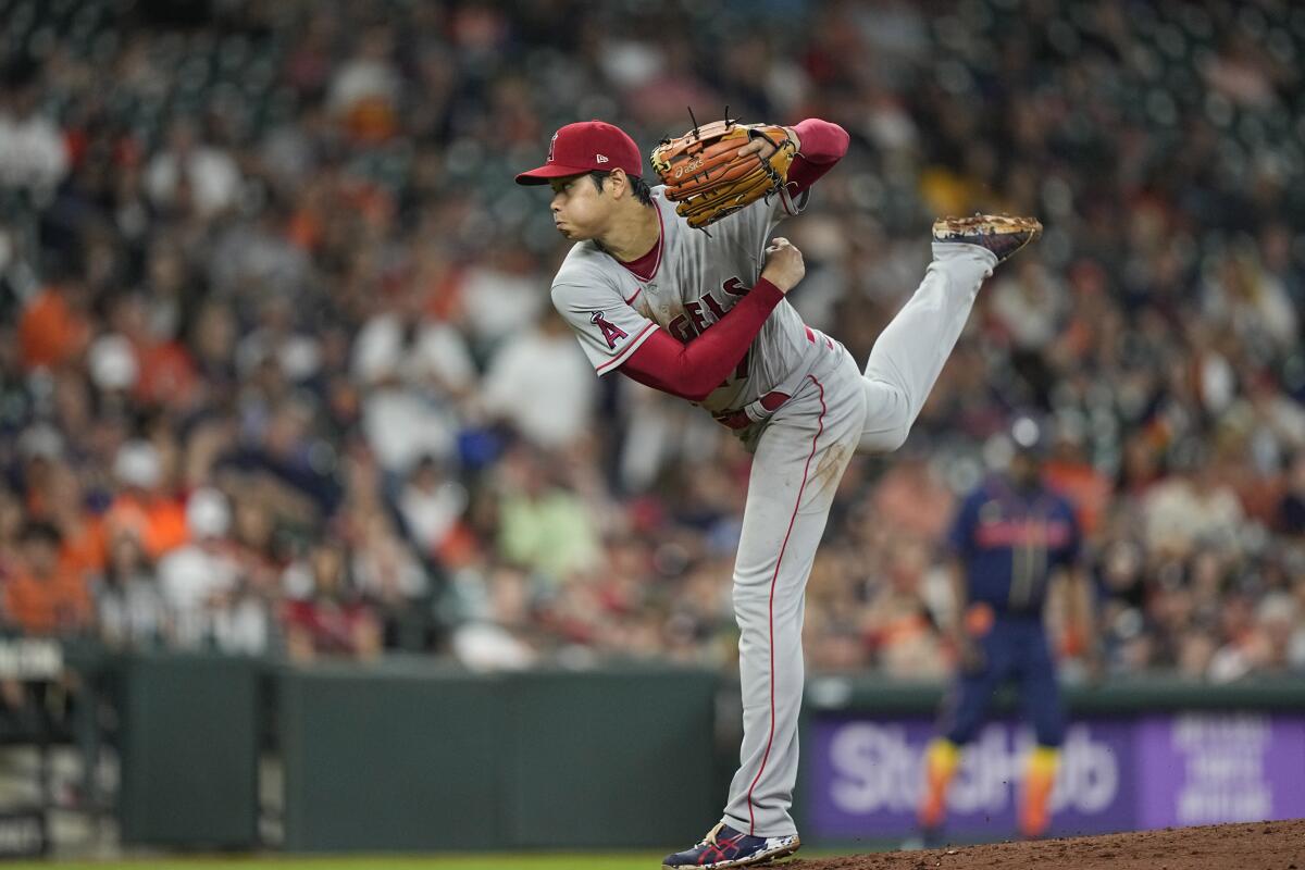Los Angeles Angels starting pitcher Shohei Ohtani throws during the third inning of baseball game against the Houston Astros Wednesday, April 20, 2022, in Houston. (AP Photo/David J. Phillip)