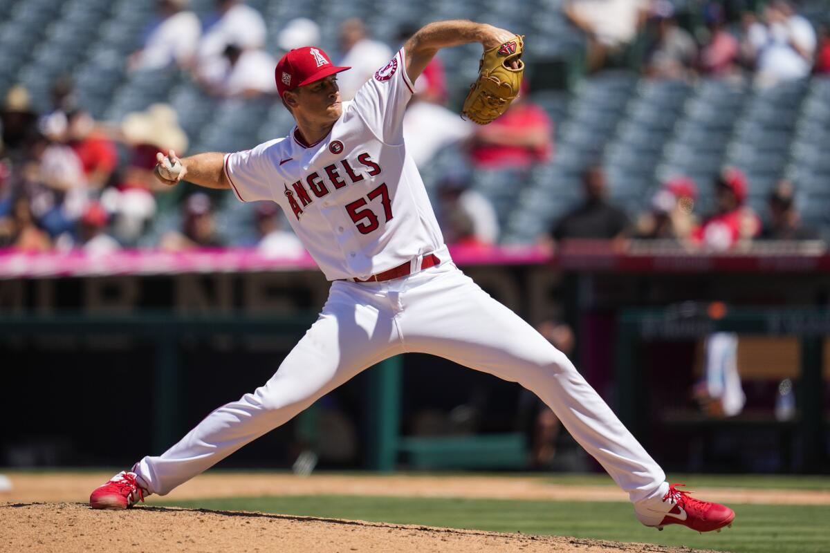Angels relief pitcher Aaron Slegers throws during the sixth inning on Sunday.