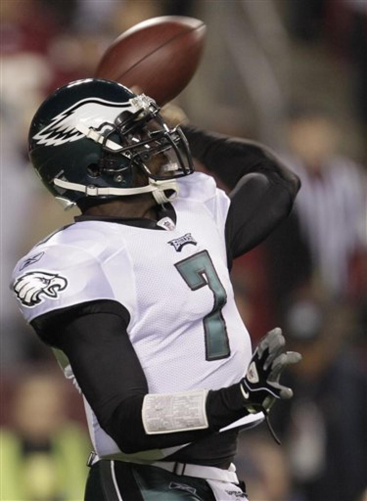 A few Super Bowl fans wear Michael Vick jerseys, all these years later