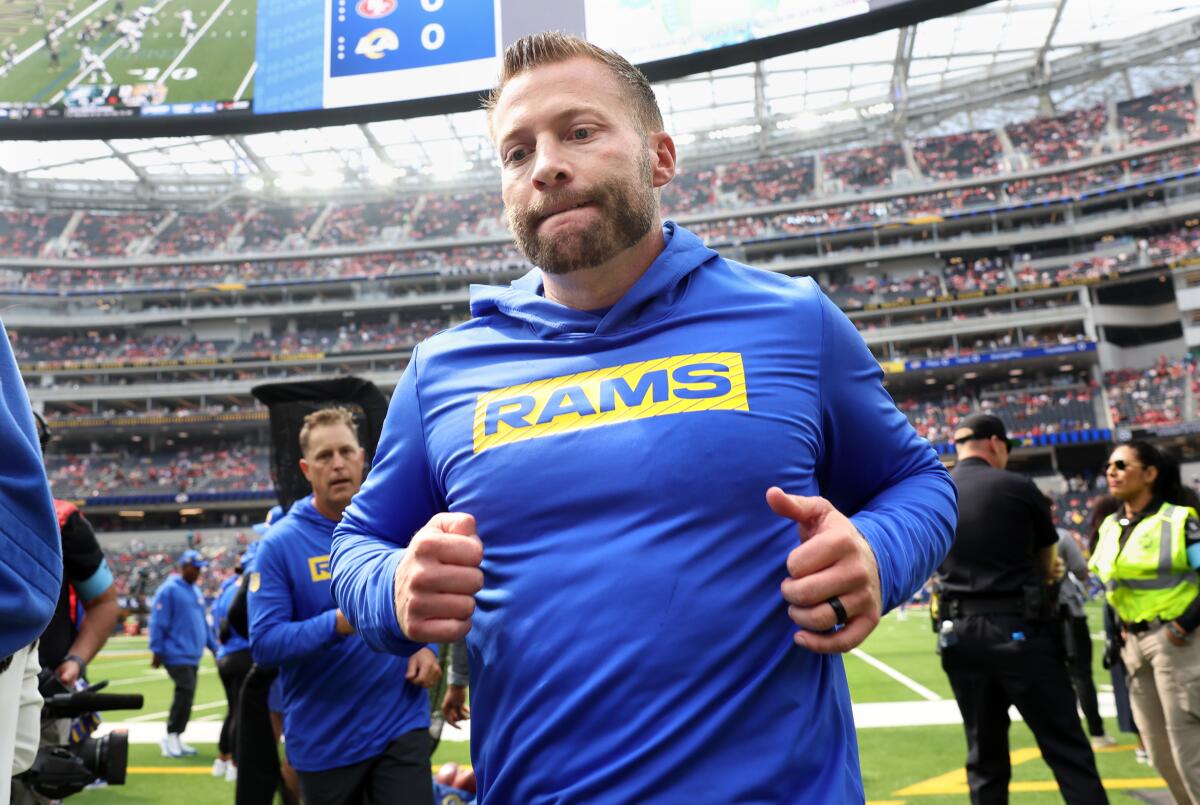 Rams coach Sean McVay jogs toward the locker room at SoFi Stadium. 