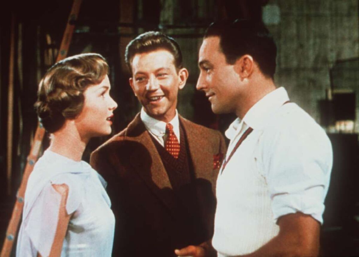 The stars of "Singin' in the Rain," from left, Debbie Reynolds, Donald O'Connor and Gene Kelly.