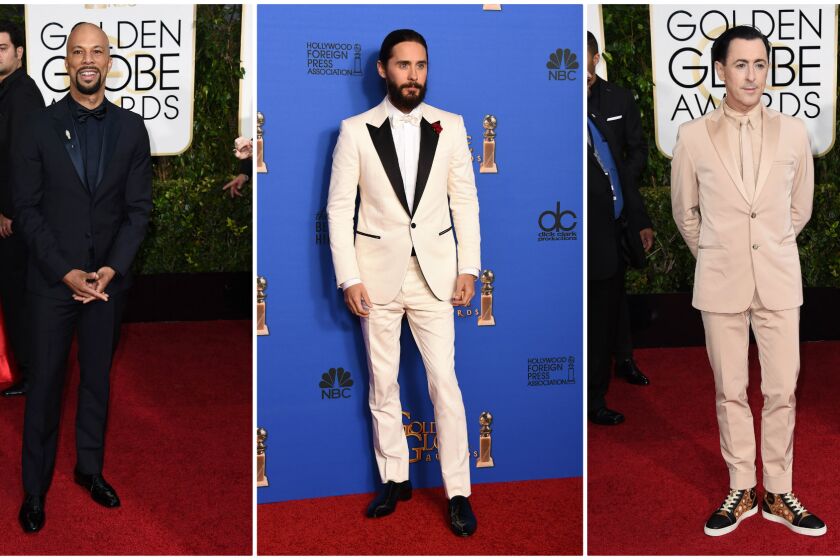 At left, Common's blue tuxedo puts him on trend at the 72nd Golden Globes, while Jared Leto, center, stands out in Lanvin and Alan Cumming, right, was one of the evening's menswear misses in Calvin Klein Collection.