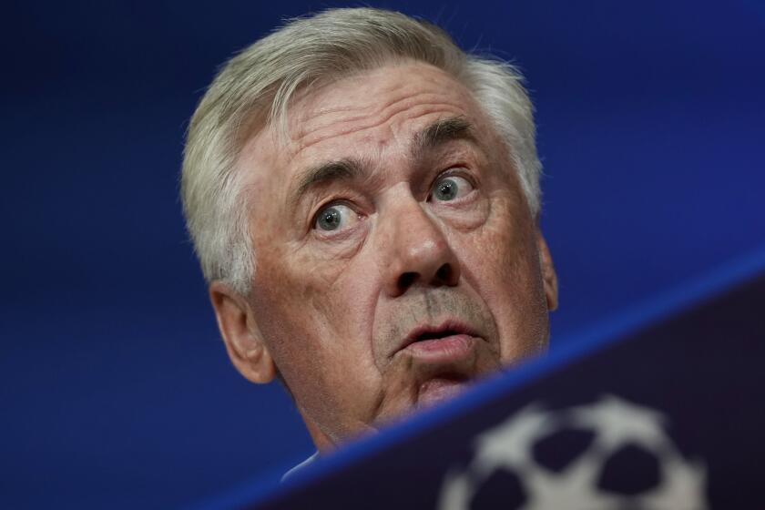 Real Madrid's head coach Carlo Ancelotti attends a press conference in Munich, Germany, Monday, April 29, 2024, ahead of the Champions League semi final first leg soccer match between FC Bayern Munich and Real Madrid. (AP Photo/Matthias Schrader)