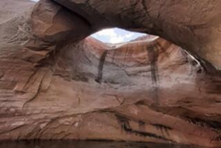 This undated photo provided by the National Park Service shows Double Arch prior to collapse in Rock Creek Bay of the Glen Canyon National Recreation Area, Utah. (National Park Service via AP)