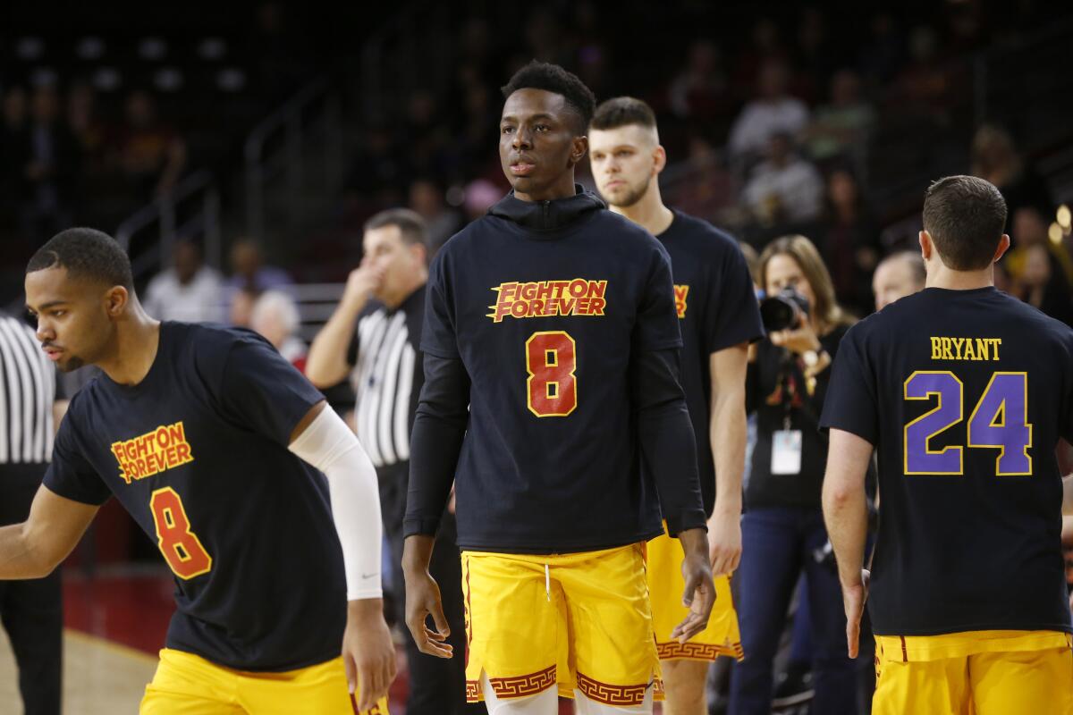 USC Trojans forward Onyeka Okongwu (21) wears a warm up tee-shirt in remembrance of Kobe Bryant before the start of a game against Utah at the Galen Center on Thursday.