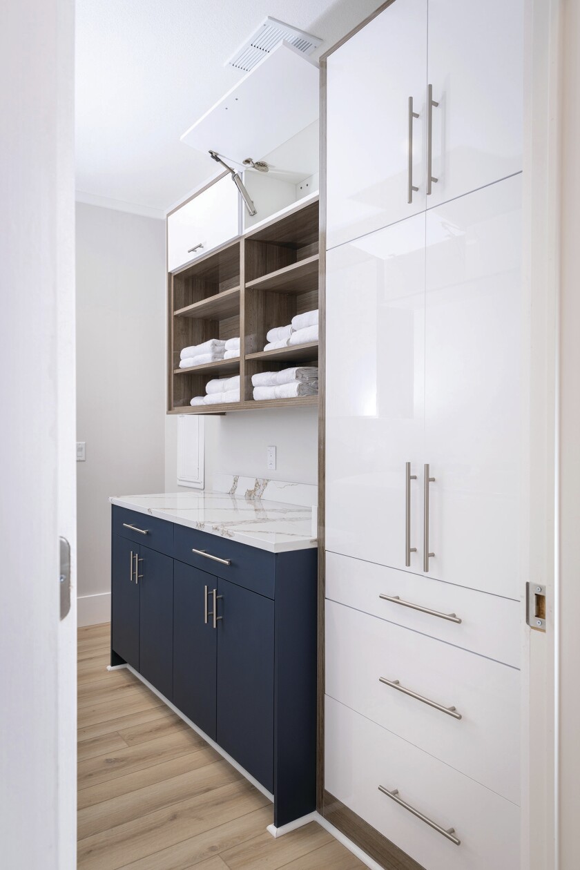 Hidden storage spaces can add to the space without interrupting the design aesthetic.