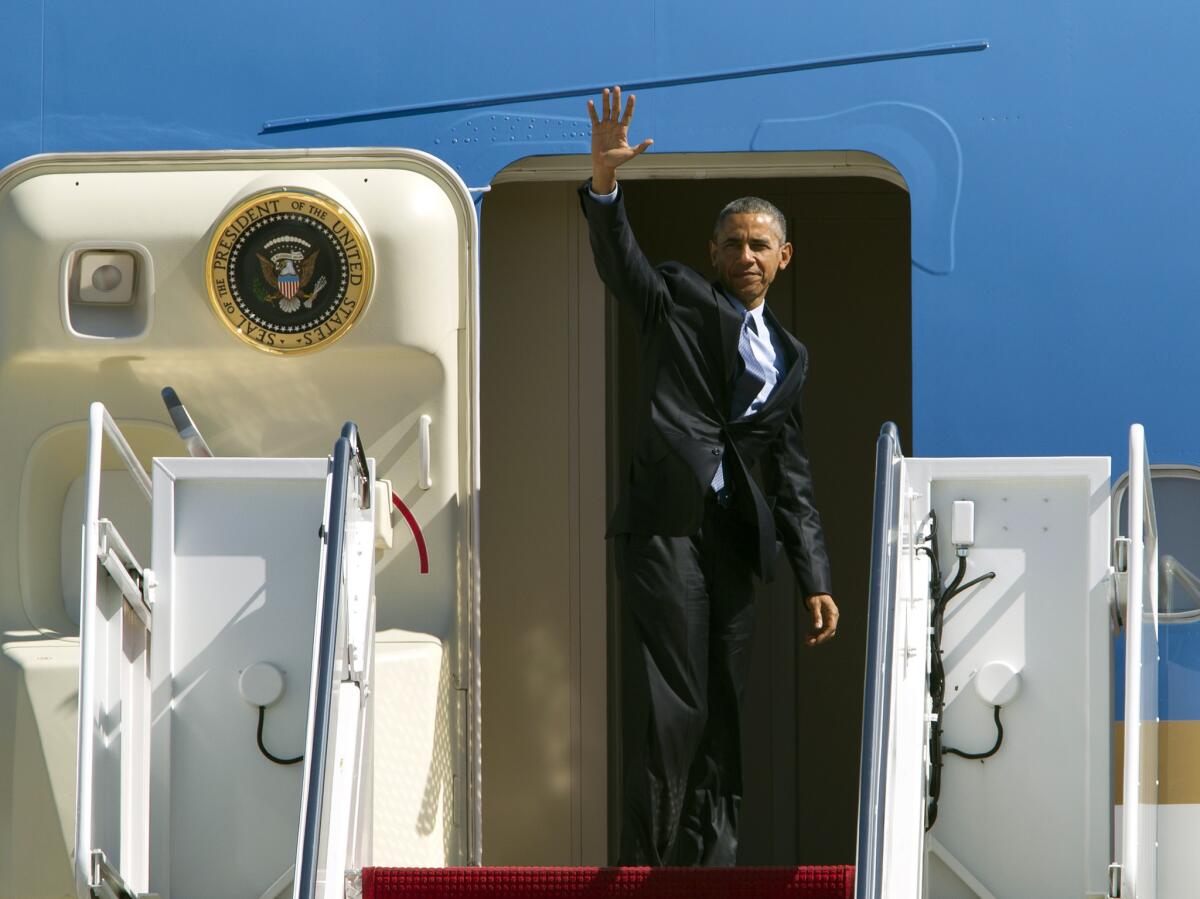 President Obama before departure at Andrews Air Force Base, Md., on March 12, 2015, en route to Los Angeles, where he is expected to tape an appearance on "Jimmy Kimmel Live" and attend a Democratic National Committee event.