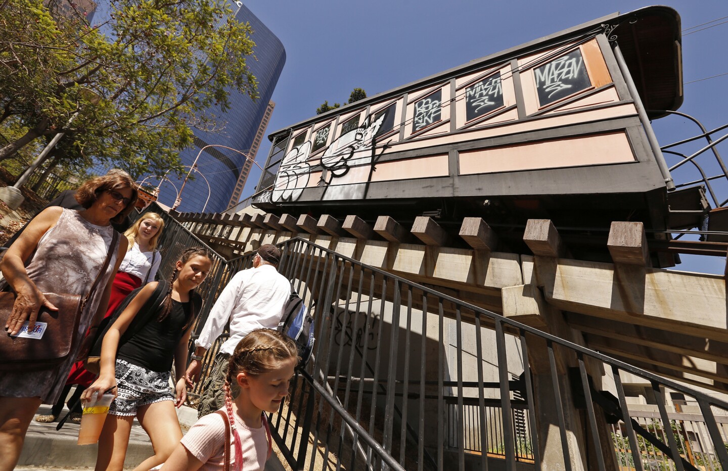 Sept. 9, 2016: People walk past the idle Angels Flight in downtown Los Angeles.