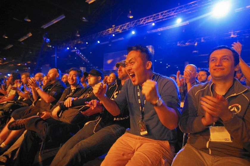 Fans show their excitement after hearing new game announcements at Activision Blizzard’s BlizzCon event in Anaheim.