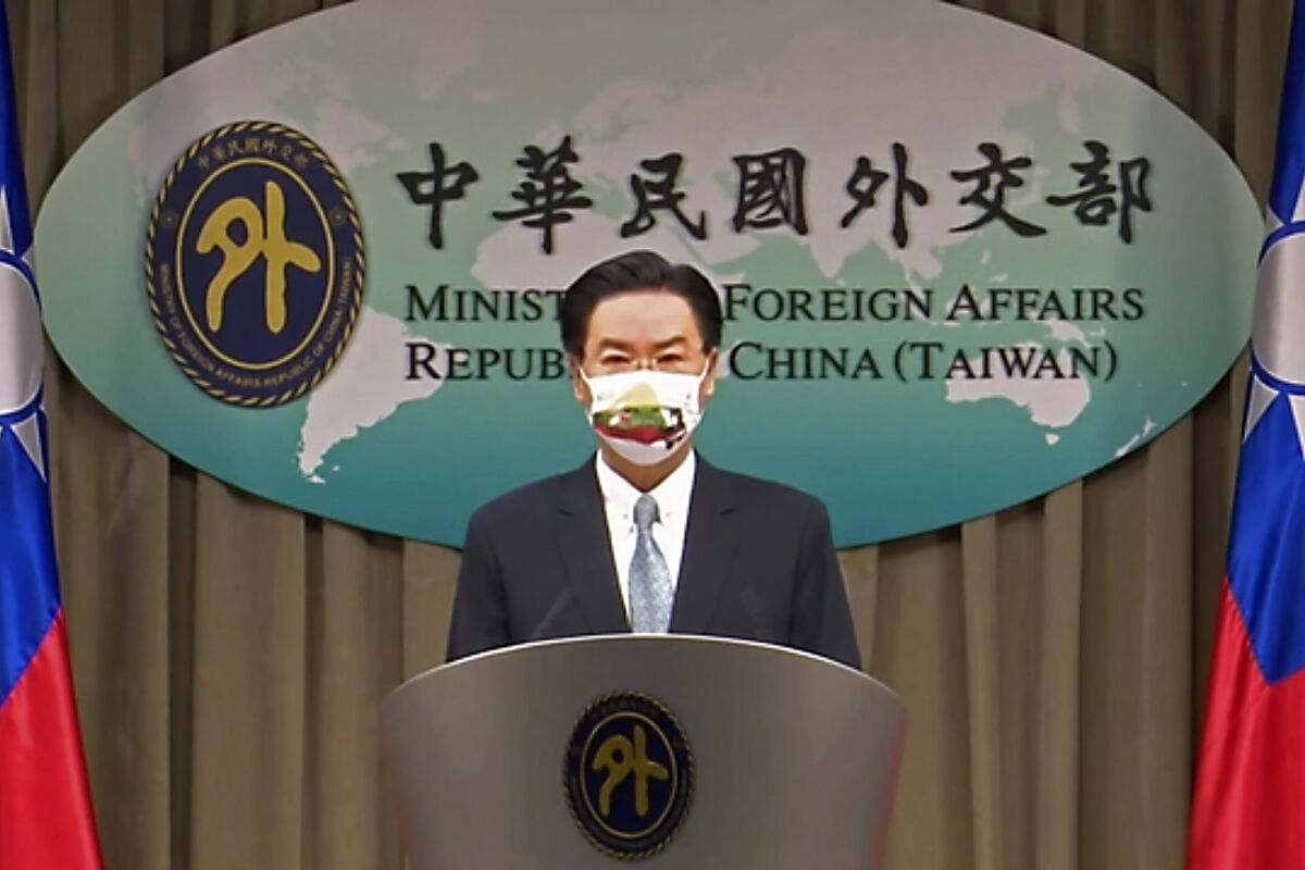 FILE - In this July 20, 2021, file image taken from a video footage run by Taiwan's Ministry of Foreign Affairs via AP Video, Taiwan Foreign Minister Joseph Wu, speaks about exchanging representative offices with Lithuania during a press briefing in Taipei, Taiwan. Lithuania on Friday, Sept. 3, 2021, recalled its ambassador to China following the Baltic country’s decision in July to allow self-governing Taiwan to open an office in its capital under its own name. (Taiwan's Ministry of Foreign Affairs AP Video, File)