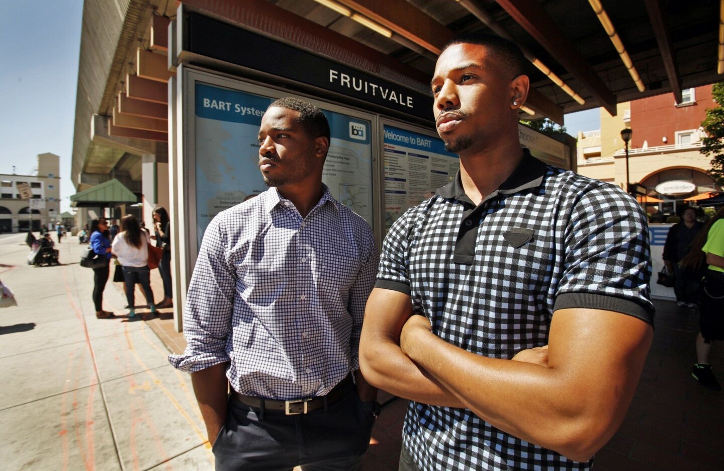 "Fruitvale Station" director Ryan Coogler, left, and actor Michael B. Jordan, right, at the BART Fruitvale station in Oakland hours before attending the film's premiere on June 20, 2013. Scenes of "Fruitvale Station" were shot in the same location where Oscar Grant was shot by a BART police officer in 2009. Four years later, Coogler has made a film about the case.