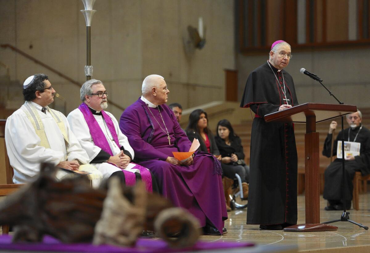 Archbishop Jose Gomez delivers remarks alongside members of the Los Angeles Council of Religious Leaders during an interfaith prayer service for immigration reform at the Cathedral of Our Lady of the Angels.