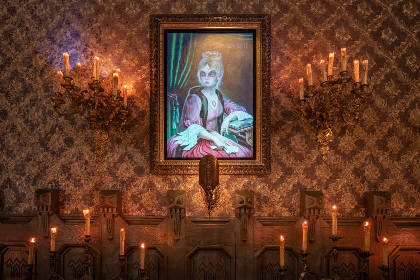 One of the Haunted Mansion's original portraits, "April to December," is returning.