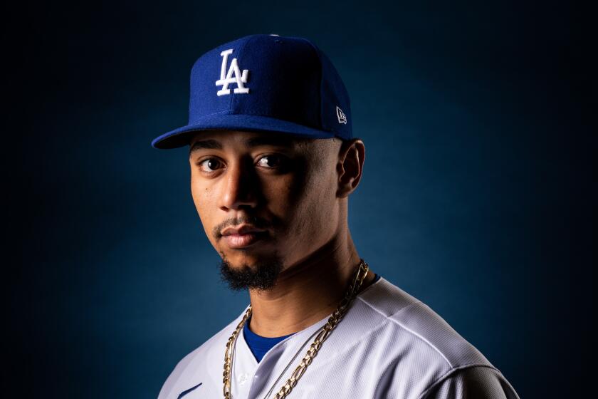 PHOENIX, ARIZ. - FEBRUARY 20: Los Angeles Dodgers outfielder Mookie Betts (50) poses for a portrait during Spring Training photo day at Camelback Ranch on Thursday, Feb. 20, 2020 in Phoenix, Ariz. (Kent Nishimura / Los Angeles Times)