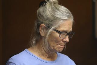 Leslie Van Houten reacts after hearing she is eligible for parole during a hearing on Wednesday, Sept. 6, 2017 at the California Institution for Women in Corona, Calif. Van Houten, the youngest of Charles Manson's murderous followers, was granted parole by a California board Wednesday. (Stan Lim/Los Angeles Daily News via AP, Pool)