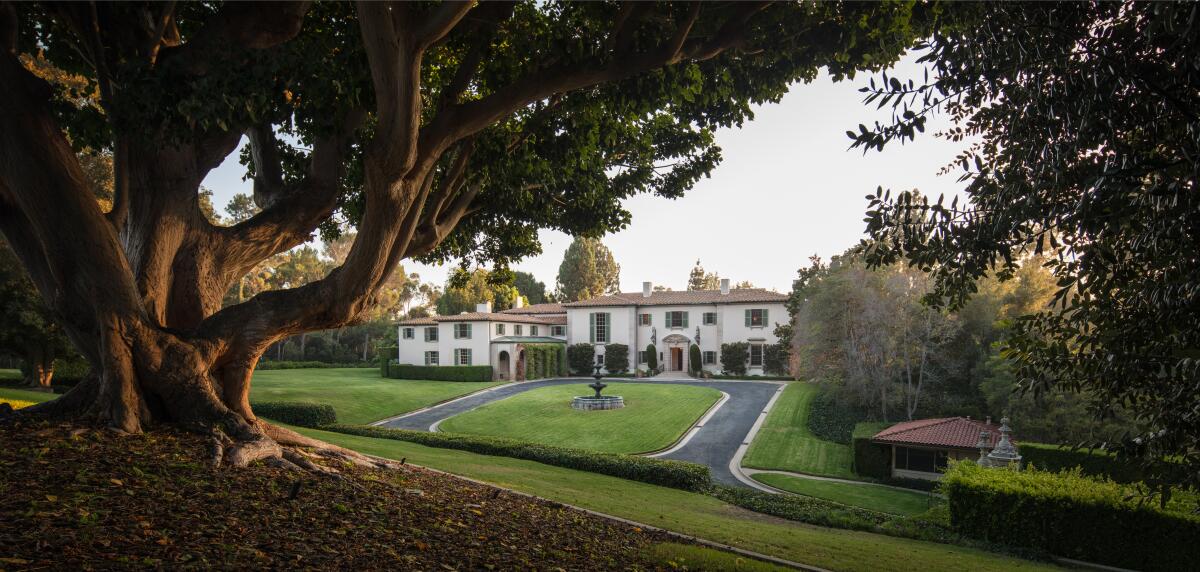 An overview of the landscaped grounds and home exterior.