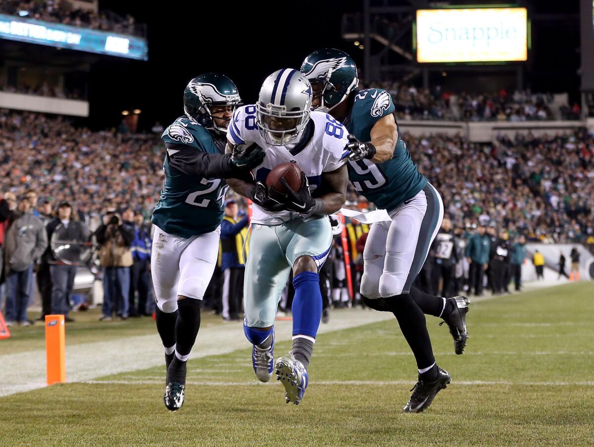 Cowboys receiver Dez Bryant catches one of his three touchdowns in a win against the Eagles.