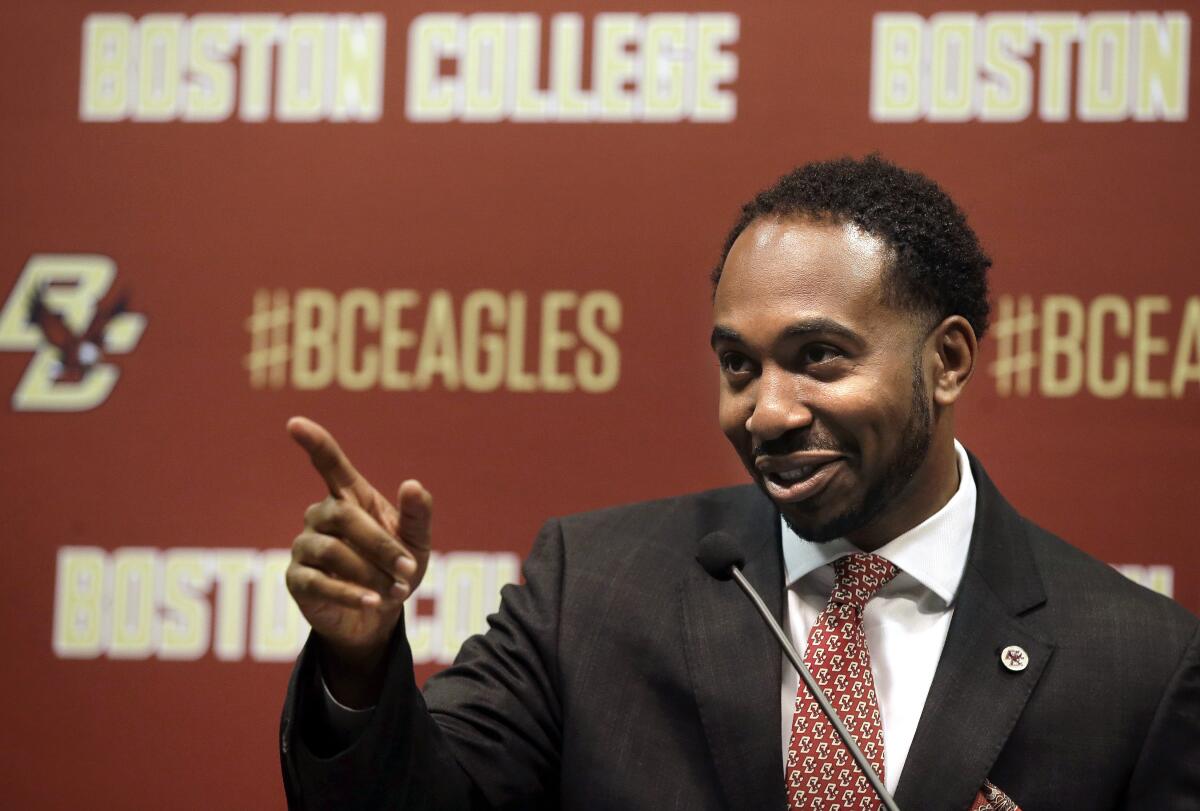 Martin Jarmond gestures after being introduced as Boston College's new athletic director in April 2017.