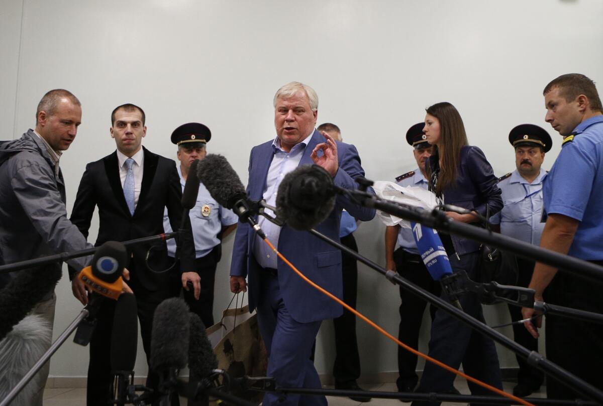 Russian lawyer Anatoly Kucherena speaks to the media after visiting National Security Agency leaker Edward Snowden.