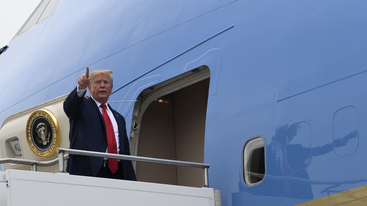 President Trump on the steps of Air Force One.