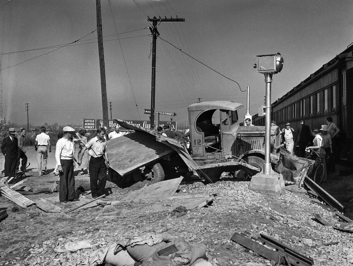 Oct. 19, 1935: The remains of the sand truck after the train crashed into it are shown.