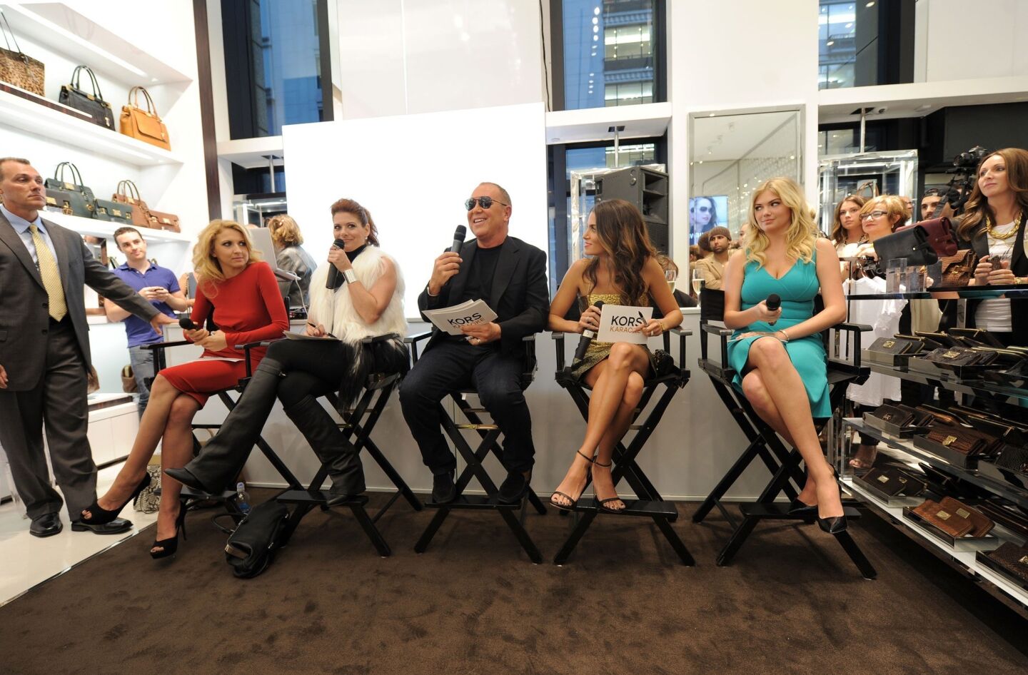 Actress Nina Arianda, actress Debra Messing, designer Michael Kors, actress Nikki Reed and model Kate Upton celebrate Fashion's Night Out at Michael Kors in New York City.