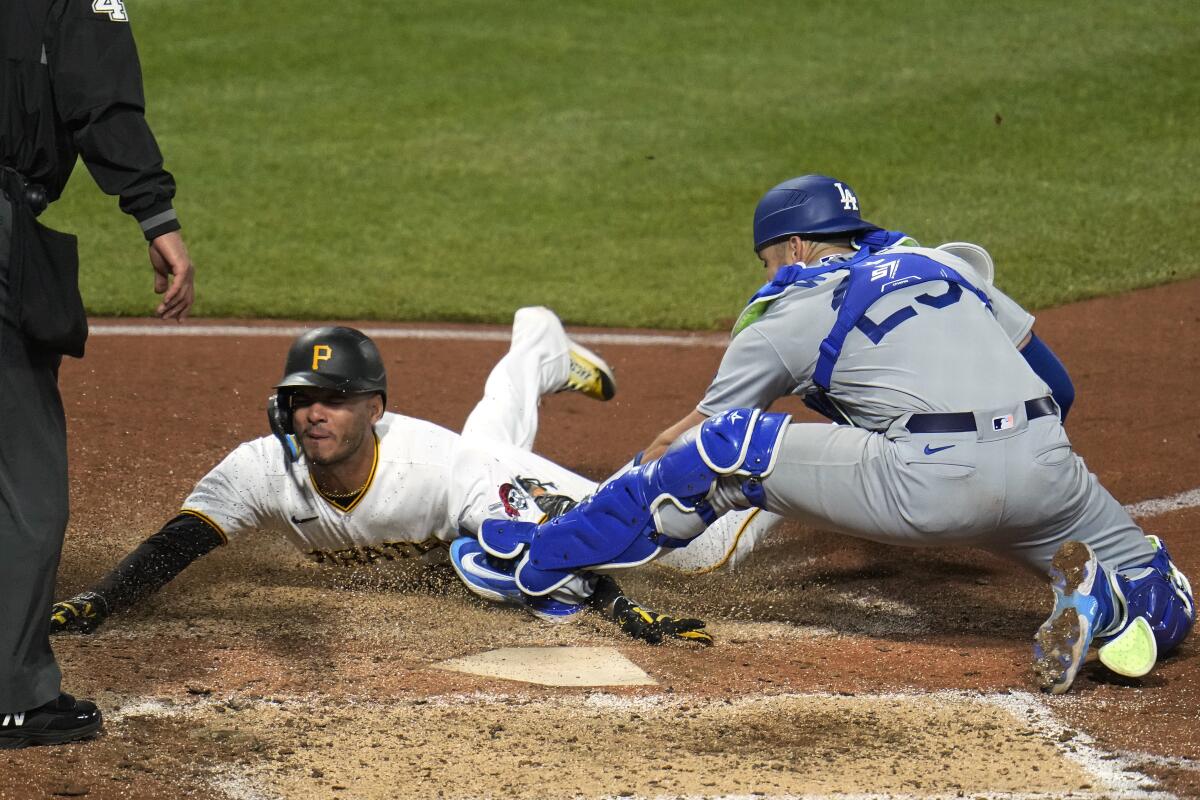 Tucupita Marcano is blocked from the plate by Austin Wynns in the seventh inning. 
