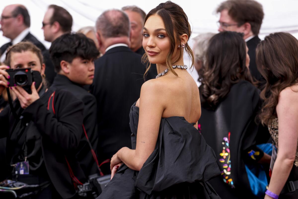 Maddie Ziegler arriving at the 94th Academy Awards.