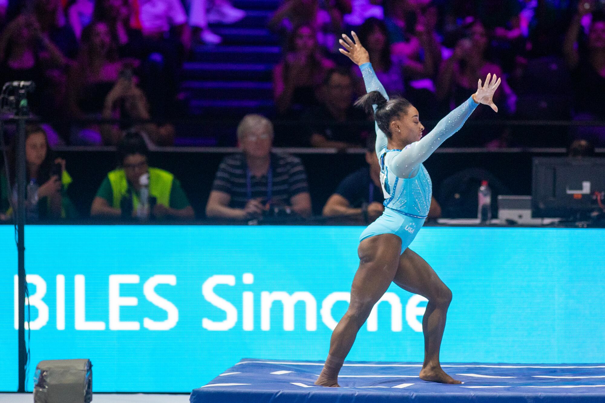 Simone Biles of the United States reacts after performing a vault in Belgium in 2023.