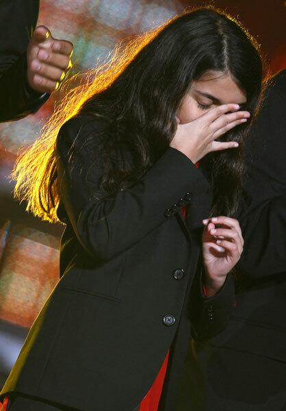 Prince Michael Jackson II (Blanket) reacts on stage at the end of the 'Michael Forever' tribute concert, which honors his father, Michael Jackson, at the Millennium Stadium in Cardiff, Wales.
