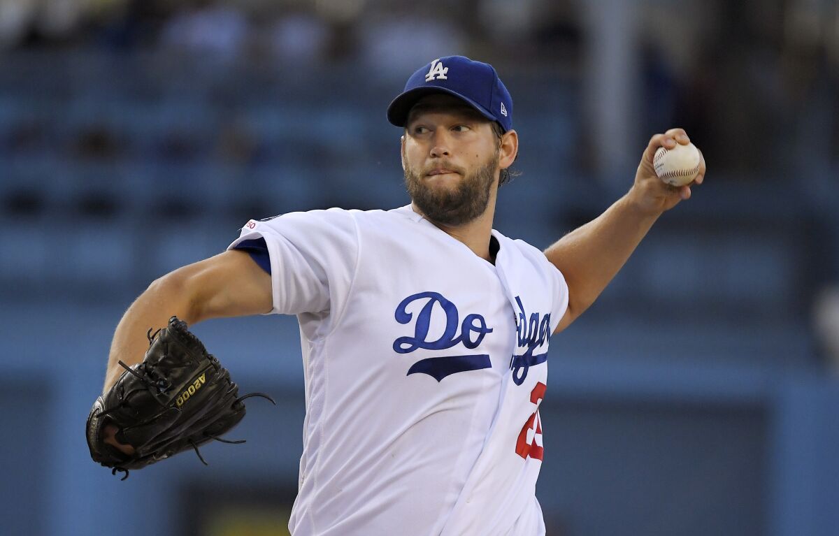 Los Angeles Dodgers starting pitcher Clayton Kershaw throws during the first inning of the team's baseball game against the St. Louis Cardinals on Tuesday, Aug. 6, 2019, in Los Angeles. (AP Photo/Mark J. Terrill)