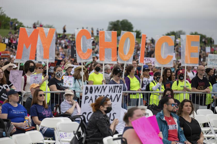 Abortion rights demonstrators rally, Saturday, May 14, 2022, on the National Mall in Washington. Demonstrators are rallying from coast to coast in the face of an anticipated Supreme Court decision that could overturn women’s right to an abortion. (AP Photo/Amanda Andrade-Rhoades)