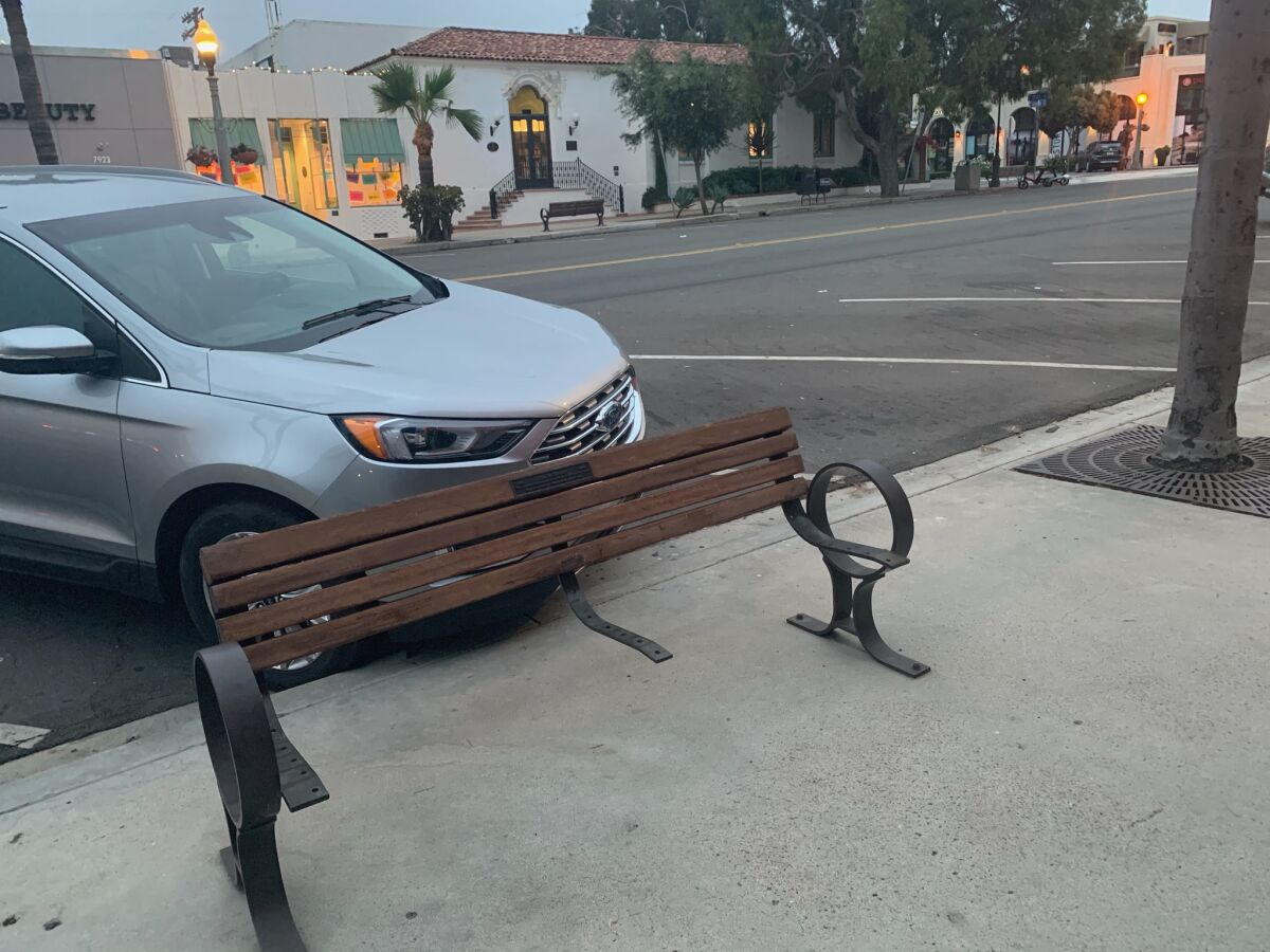 This refurbished wooden bench on Girard Avenue was vandalized Aug. 23.