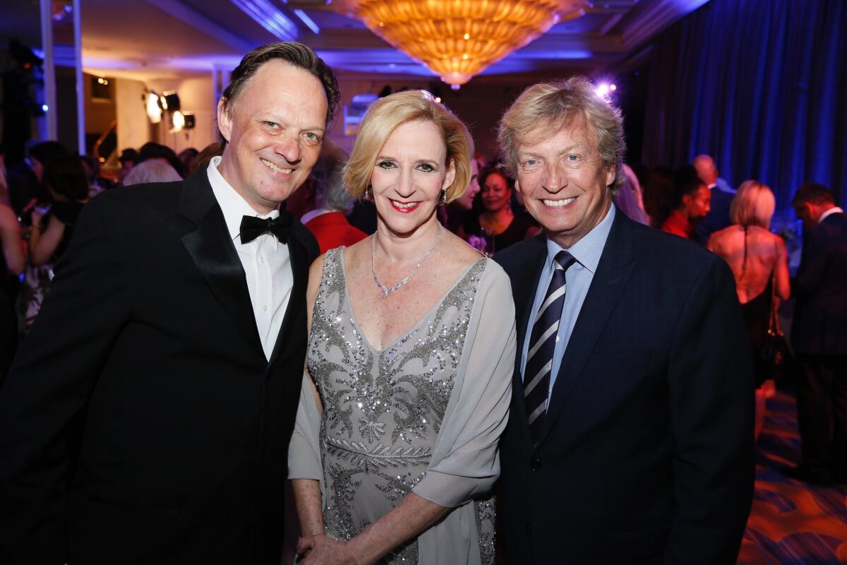 From left, Los Angeles Ballet artistic directors Thordal Christensen and Colleen Neary and "So You Think You Can Dance" co-creator Nigel Lythgoe attend the 2017 Los Angeles Ballet Gala at the Beverly Wilshire in Beverly Hills on April 21.