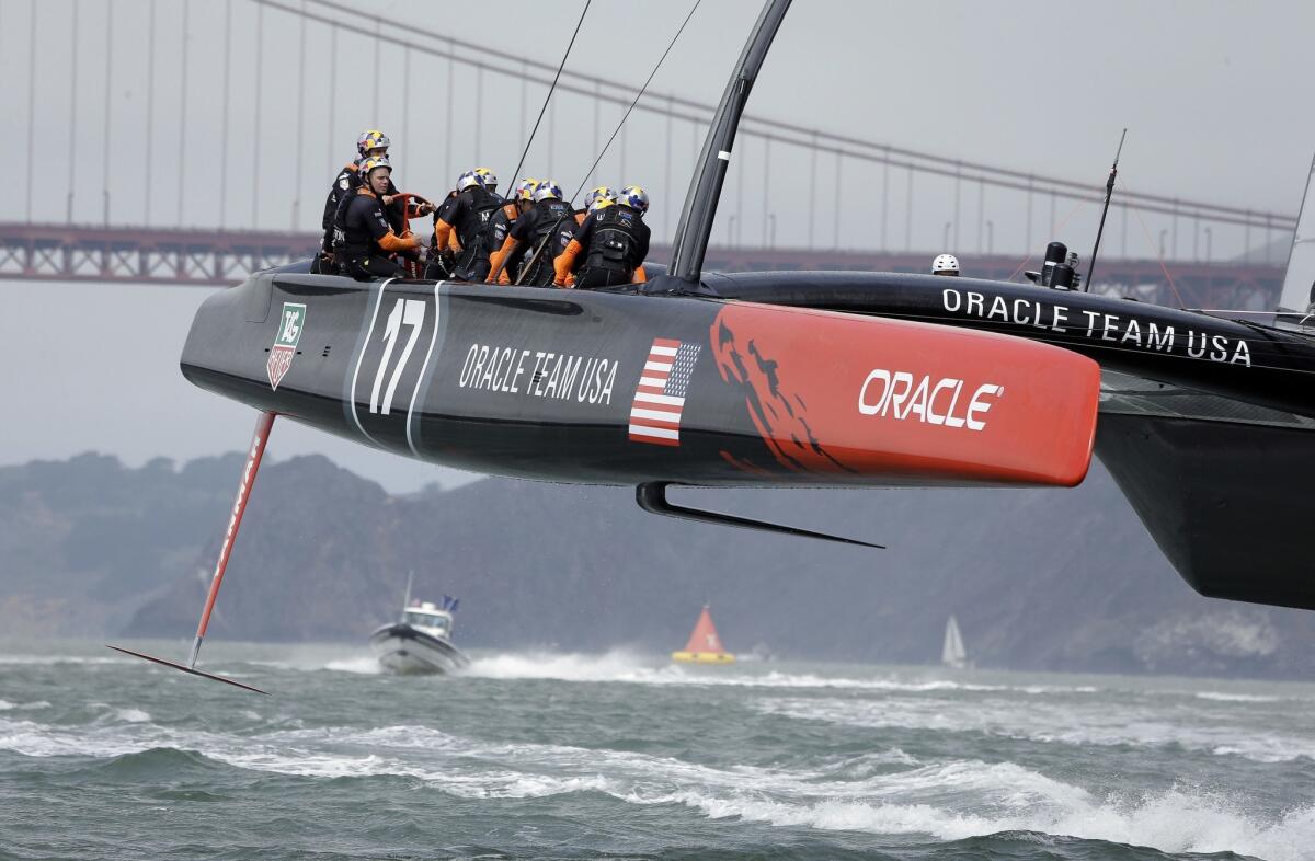 America's Cup defender Oracle Team USA was hit with sanctions on Tuesday.
