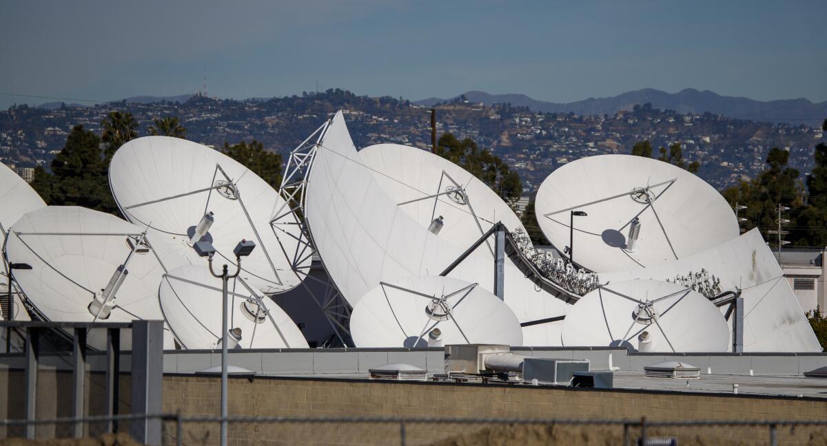 DirecTV satellite dishes at AT&T's Los Angeles Broadcast Center in Culver City last month.