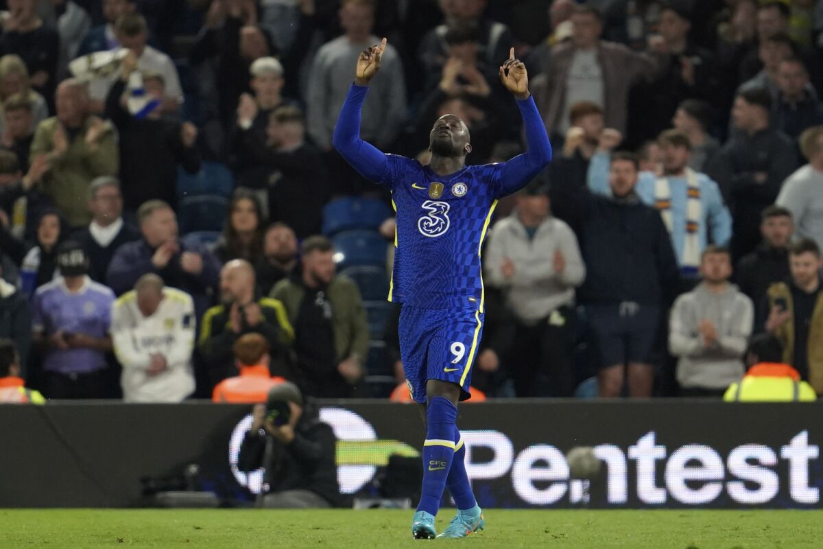 Chelsea's Romelu Lukaku celebrates after scoring his sides third goal during the English Premier League soccer match between Leeds United and Chelsea at Elland Road in Leeds, England, Wednesday May 11, 2022. (AP Photo/Jon Super)