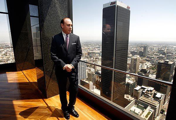 Kent S. Handleman of Thomas Properties Group stands in the former headquarters of Arco on Flower Street in downtown L.A., where bosses set themselves up in palatial quarters that still command awe even though the company cleared out more than a decade ago.