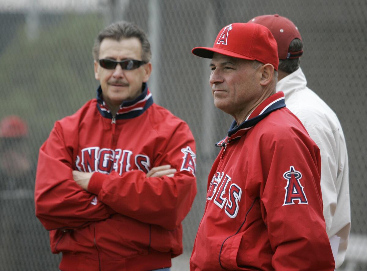 Bill Stoneman, right, then a consultant with the Angels, stands with team owner Arte Moreno back in 2008. Stoneman was named the Angels' interim general manager on July 1, 2015.