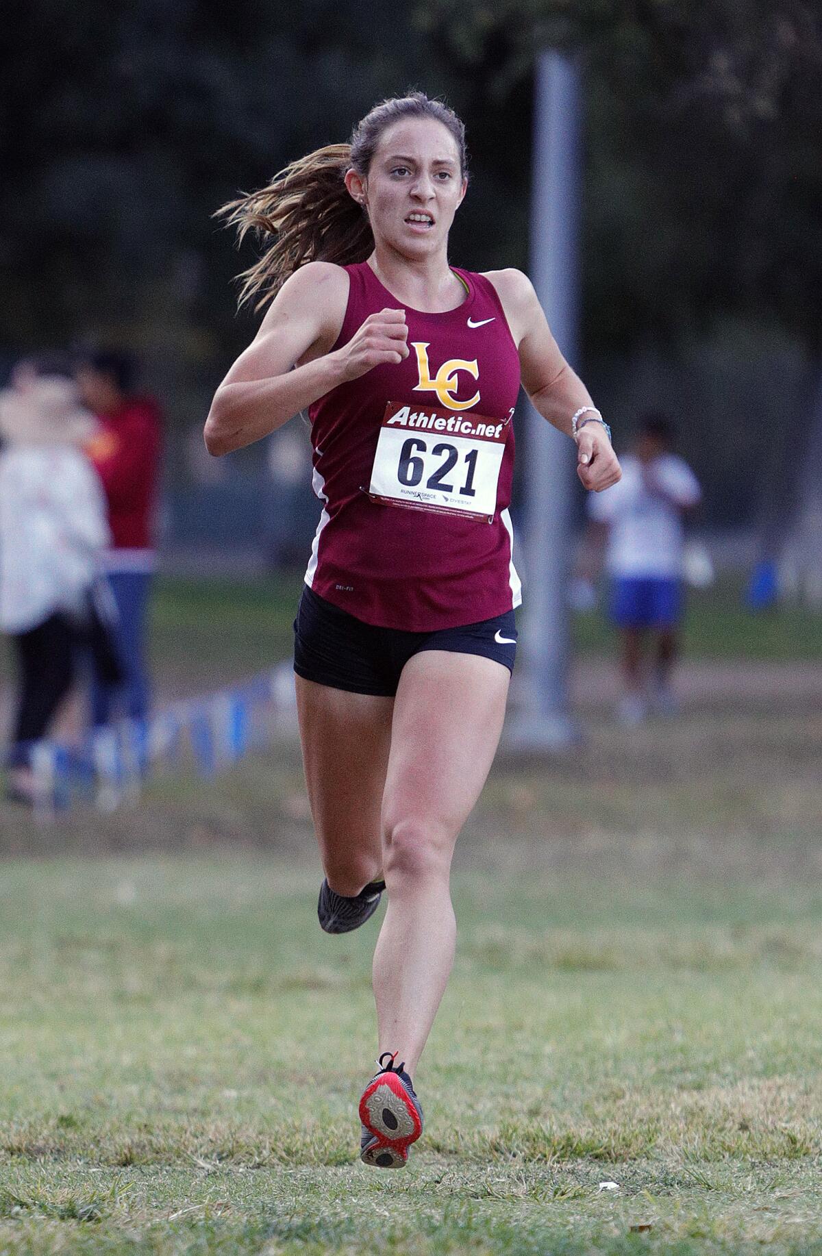 La Canada's Ellaney Matarese runs to the finish in first place in a Rio Hondo League cross-country race at Crescenta Valley Regional Park on Tuesday, October 15, 2019.